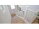 Carpeted stairs with white railing lead to upper level at 6098 Darkfeather Way, Las Vegas, NV 89139