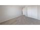 Bedroom featuring carpet and double door closet with white walls at 648 Jumbled Sage Ct, Henderson, NV 89015