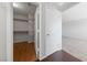 Hallway with access to closet with shelving and access to room with carpet at 648 Jumbled Sage Ct, Henderson, NV 89015