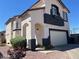 Charming two-story home with attached garage and well-maintained front yard at 648 Jumbled Sage Ct, Henderson, NV 89015