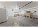 Spacious garage with ample storage cabinets and shelving units at 648 Jumbled Sage Ct, Henderson, NV 89015
