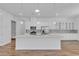 Beautiful kitchen island with modern stainless steel appliances at 660 Otter Brook St, Henderson, NV 89011