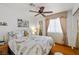 Charming bedroom with a queen-sized bed, featuring an Eiffel Tower theme and stylish decor at 6746 Shelter Ln, Las Vegas, NV 89103