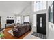Inviting foyer with hardwood floors, high ceilings, and a stylish front door with sidelights at 6746 Shelter Ln, Las Vegas, NV 89103