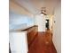 Bright hallway features hardwood floors, built-in cabinets, and natural light at 6746 Shelter Ln, Las Vegas, NV 89103