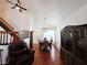 Charming living room featuring hardwood floors and a cozy dining area with a stylish chandelier at 6746 Shelter Ln, Las Vegas, NV 89103