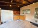 Covered patio with wet bar, wooden cabinets, sink, and tile flooring at 6746 Shelter Ln, Las Vegas, NV 89103