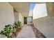 View of front door and pathway to the house at 6822 Garden Grove Ave, Las Vegas, NV 89103