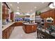 Spacious kitchen with abundant cabinets, an island, stainless steel appliances, and an open design at 69 Tapadero Ln, Las Vegas, NV 89135