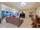 Cozy living room with a fireplace, media center, and stylish decor at 69 Tapadero Ln, Las Vegas, NV 89135