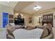 Inviting living room features a cozy fireplace, stylish bar, and plush seating for relaxed gatherings at 69 Tapadero Ln, Las Vegas, NV 89135