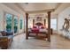 Spacious main bedroom features hardwood floors, sitting area, and outdoor access at 69 Tapadero Ln, Las Vegas, NV 89135