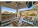 Inviting outdoor seating area with beautiful views, creating the perfect space for relaxation at 69 Tapadero Ln, Las Vegas, NV 89135
