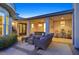 Inviting covered patio with stylish outdoor seating and elegant decor, perfect for entertaining at 69 Tapadero Ln, Las Vegas, NV 89135