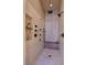 Elegant tiled shower featuring rainfall shower head, multiple jets, and a built-in bench at 69 Tapadero Ln, Las Vegas, NV 89135