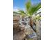 Close up of custom rock waterfall spilling into shimmering swimming pool at 69 Tapadero Ln, Las Vegas, NV 89135