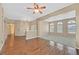 Large living room with hardwood floors and carpet and a view to other rooms in the house at 6920 Haven Hollow Ave, Las Vegas, NV 89130