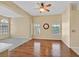 Spacious living area with hardwood floors, ceiling fan, and plenty of natural light at 6920 Haven Hollow Ave, Las Vegas, NV 89130
