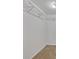Walk-in closet featuring carpeted floor and installed wire rack shelving at 6920 Haven Hollow Ave, Las Vegas, NV 89130