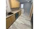 Open kitchen area with a modern faucet and stainless steel appliances at 6955 N Durango Dr # 1013, Las Vegas, NV 89149