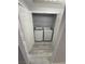 Hall laundry closet with side by side washer and dryer, plus shelving at 6955 N Durango Dr # 1013, Las Vegas, NV 89149