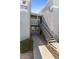 Exterior apartment building entrance with stairway leading to the upper level unit at 6955 N Durango Dr # 2054, Las Vegas, NV 89149