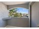 Balcony with a view of the parking area and apartment complex in the distance at 6955 N Durango Dr # 2054, Las Vegas, NV 89149