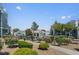 Apartment complex with trees, manicured lawns, and walkways at 6955 N Durango Dr # 2054, Las Vegas, NV 89149
