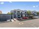 Apartment complex exterior with parking, covered parking spots, and well-maintained landscaping at 6955 N Durango Dr # 2054, Las Vegas, NV 89149
