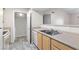 Kitchen boasts stainless steel sink, matching appliances, and durable countertops at 6955 N Durango Dr # 2054, Las Vegas, NV 89149