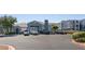 Exterior shot of the property's parking lot with a well-maintained building facade at 6955 N Durango Dr # 2054, Las Vegas, NV 89149
