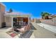 Relaxing backyard with a covered patio, barbecue, and comfortable seating, ideal for outdoor living at 7019 Shadow Crest Dr, Las Vegas, NV 89119