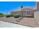 Inviting home with desert landscaping, complemented by a stone walkway to the front door at 7019 Shadow Crest Dr, Las Vegas, NV 89119