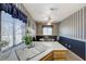 Kitchen with a breakfast nook, a window with a view, and ample counter space at 7019 Shadow Crest Dr, Las Vegas, NV 89119