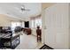 Bright living room boasts a large window, natural light, and comfortable seating at 7019 Shadow Crest Dr, Las Vegas, NV 89119