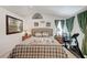 Inviting main bedroom with a bed, with natural lighting at 7019 Shadow Crest Dr, Las Vegas, NV 89119
