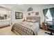 Cozy main bedroom with a bed, and attached bathroom at 7019 Shadow Crest Dr, Las Vegas, NV 89119