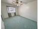 Bedroom with standard closet, a ceiling fan, and a window at 710 Tomahawk Ct, Pahrump, NV 89060