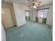 Bedroom with standard closet, a ceiling fan, and a window at 710 Tomahawk Ct, Pahrump, NV 89060