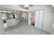 Bright breakfast nook with tile floors and sliding glass door to backyard at 710 Tomahawk Ct, Pahrump, NV 89060