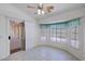 Bright breakfast nook area with natural light from windows and sliding door to patio at 710 Tomahawk Ct, Pahrump, NV 89060