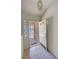 Bright entryway featuring tiled flooring and a secure screen door for added safety at 710 Tomahawk Ct, Pahrump, NV 89060