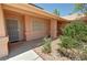 Inviting front porch with secure entry and landscaped surroundings for curb appeal at 710 Tomahawk Ct, Pahrump, NV 89060