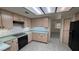 Spacious kitchen with ample cabinet storage, efficient layout, and modern appliances at 710 Tomahawk Ct, Pahrump, NV 89060