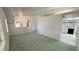 Open living room with views into the kitchen and entry, offering spaciousness at 710 Tomahawk Ct, Pahrump, NV 89060