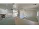 Expansive living room with a stone fireplace and open layout for flexible living at 710 Tomahawk Ct, Pahrump, NV 89060