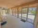 Enclosed patio with screens, offering an outdoor living space at 710 Tomahawk Ct, Pahrump, NV 89060