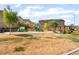 Community playground and picnic area with modern play structures, mature trees, and walking path at 7211 Alabaster Peak St, Las Vegas, NV 89166