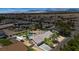 Aerial shot showcases the home, pool, and surrounding desert landscape at 7675 Butterscotch Ct, Las Vegas, NV 89131