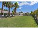 Spacious backyard with a lush green lawn, perfect for outdoor activities and relaxation at 7675 Butterscotch Ct, Las Vegas, NV 89131